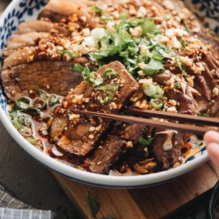 A14. Thin Slices of Poached Beef with Chef Special Spicy Sauce 麻辣牛肉