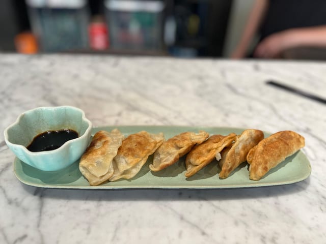 A19. Pork Potstickers (6Pc) 锅贴 (6Pc).